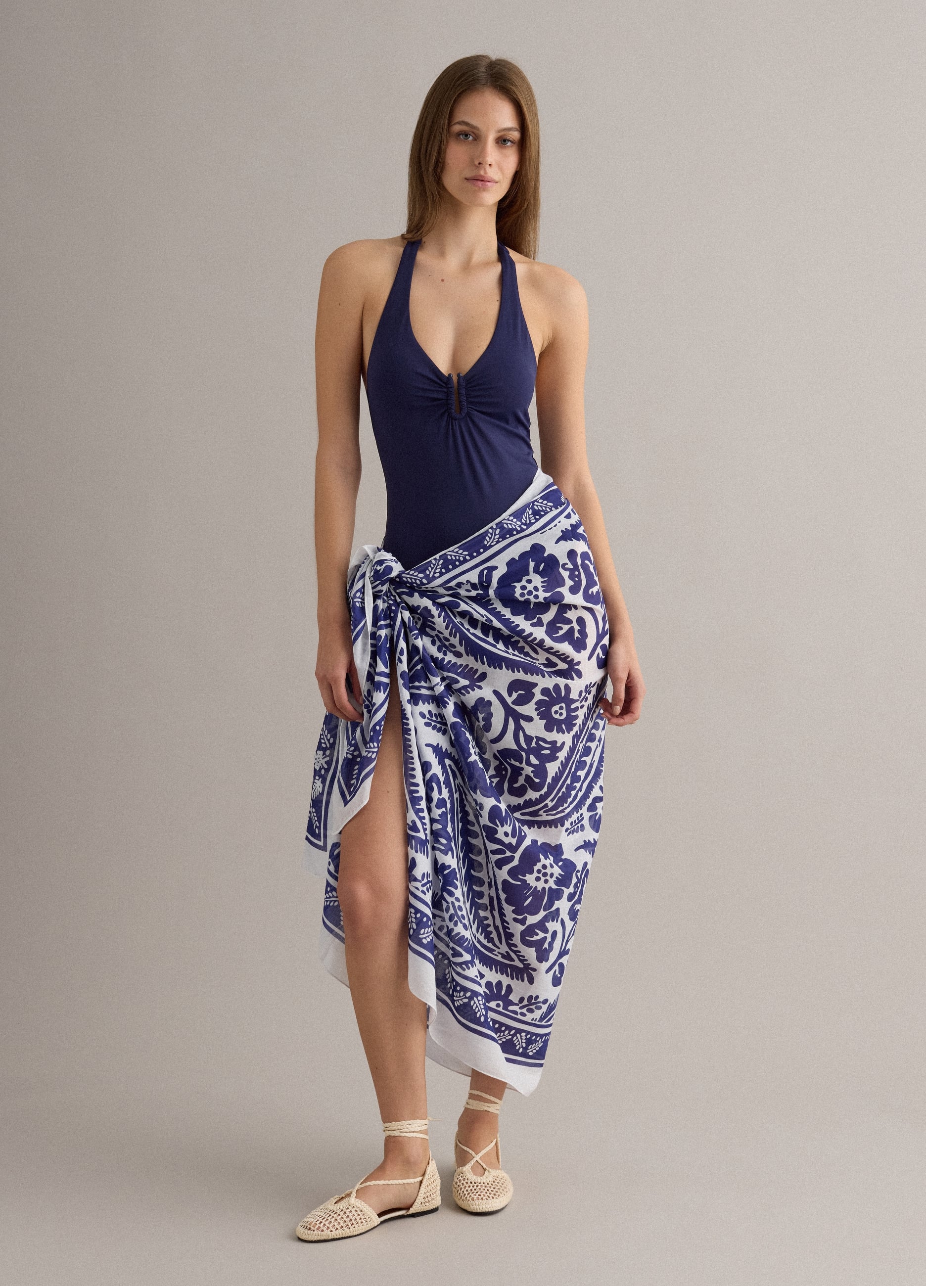 Costume Intero Blu In Tessuto Elasticizzato Con Lacci Al Collo