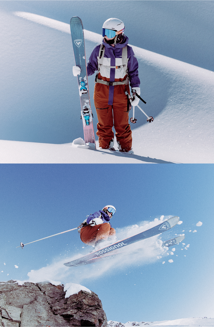 Skier wearing a yellow and black Desafio 2L ski jacket making a sharp turn on a snowy slope, with another skier in the background. Skier standing in the snow, wearing a yellow and black Desafio 2L ski jacket and holding a pair of Arcade 94 skis next to a stone wall, with snow-covered trees in the background.