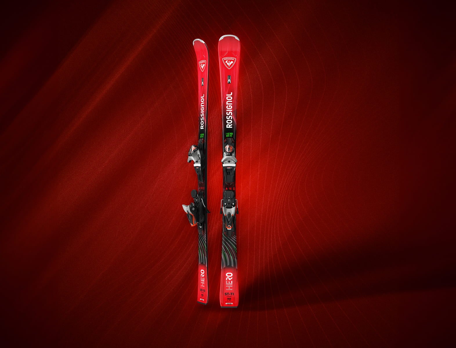 Full photo of Rossignol Hero ST TI 2627 skis with a detailed red background blending shadows and color lines