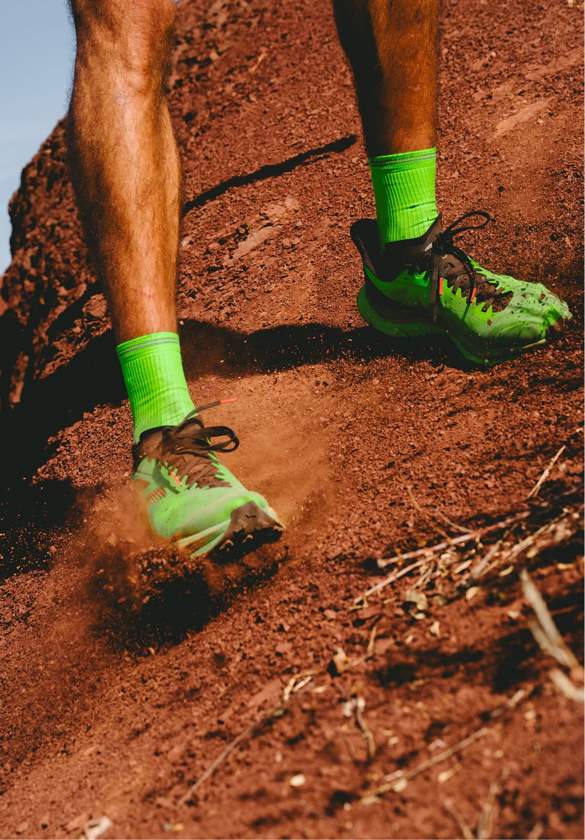 Close-up of Rossignol VEZOR shoes sliding through the dirt