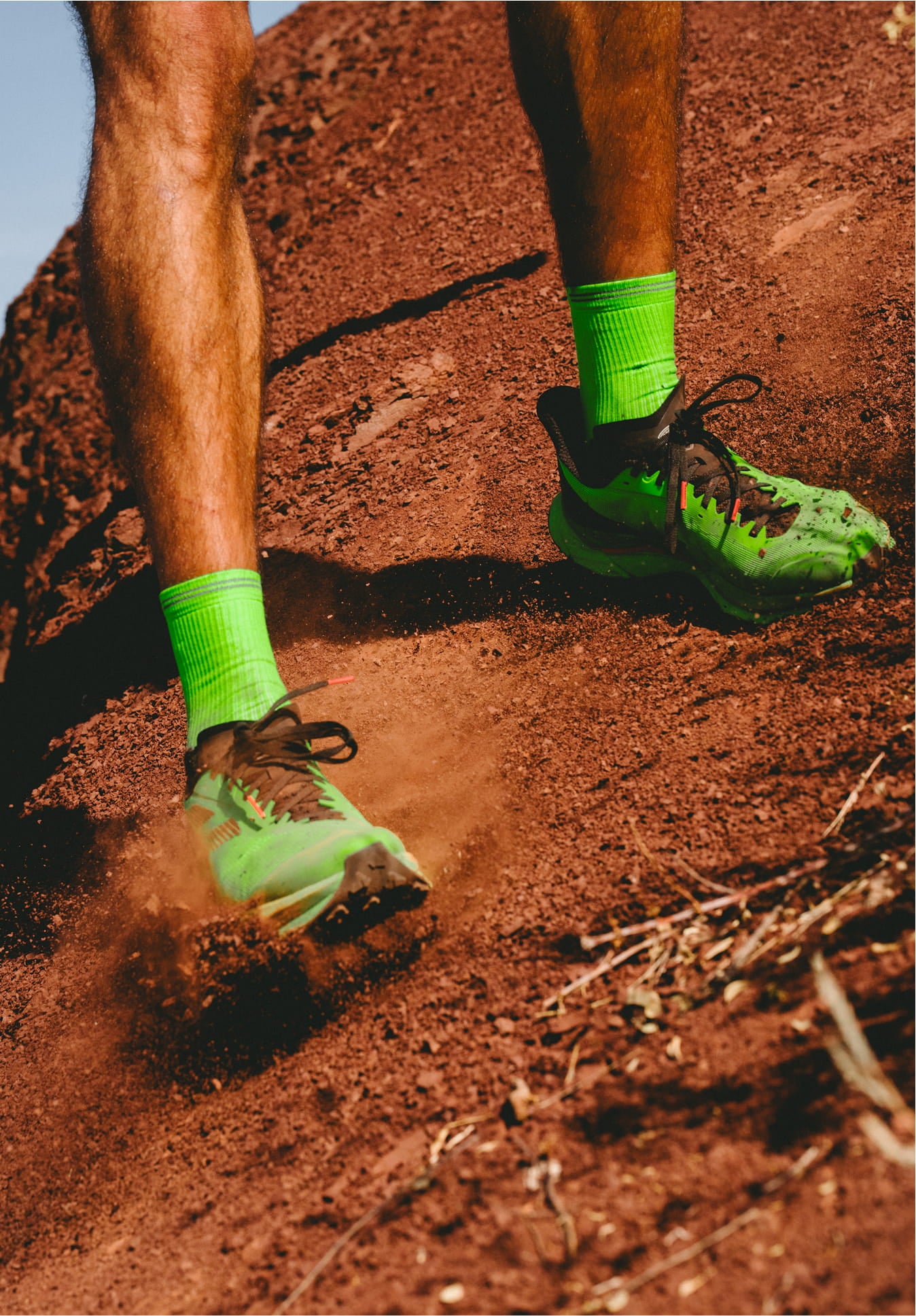  Close-up of Rossignol VEZOR shoes sliding through the dirt