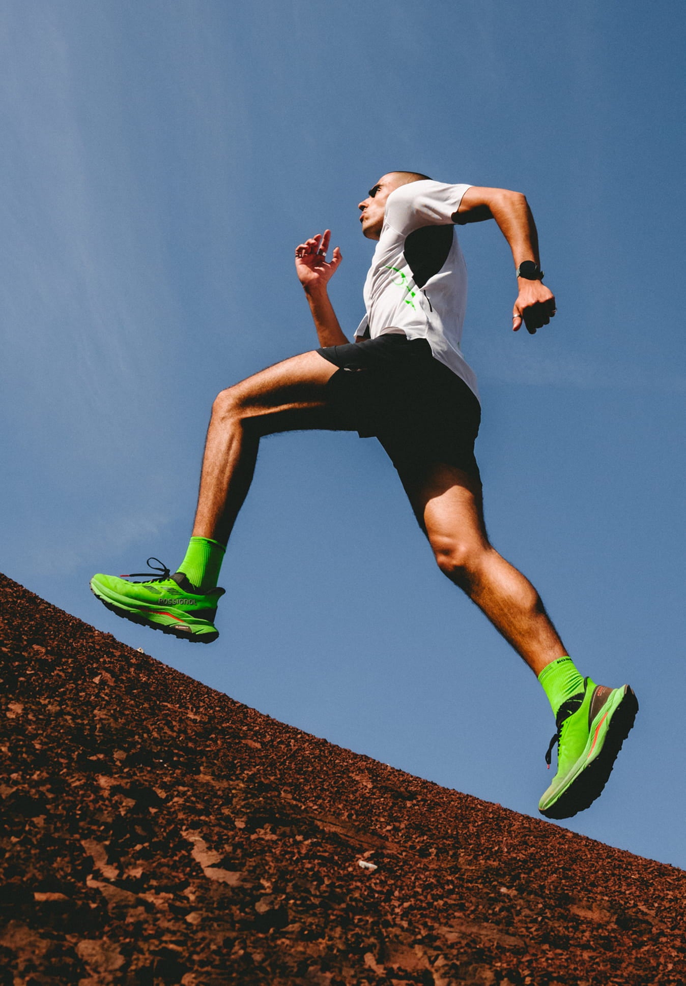 Athlete running while wearing Rossignol VEZOR shoes