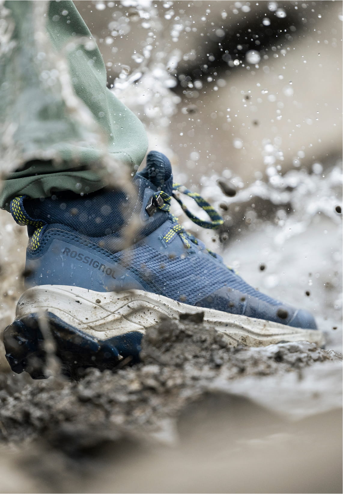 Close-up of the Rossignol ALTIRIDGE MID WP navy hiking boot on a dirt trail