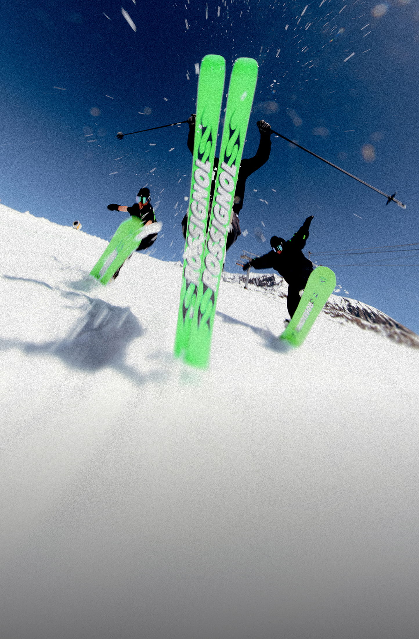 3 freeride riders using Super Blackops and Super Revenant skis from Rossignol's 2026 Super Project collection. They are performing jumps showing the bright neon green topsheet of their equipment.