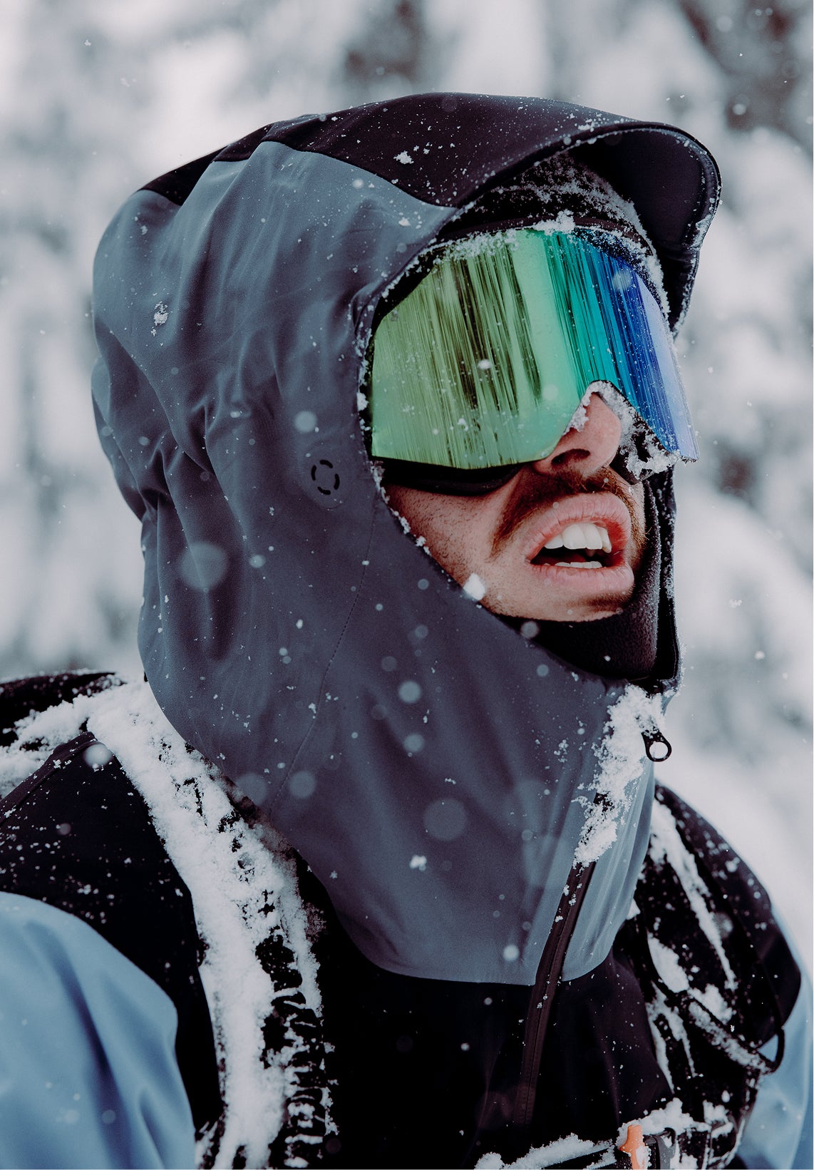 Rossignol Proclivity 3L Shell ski jacket in snowy mountain conditions with ski goggles
