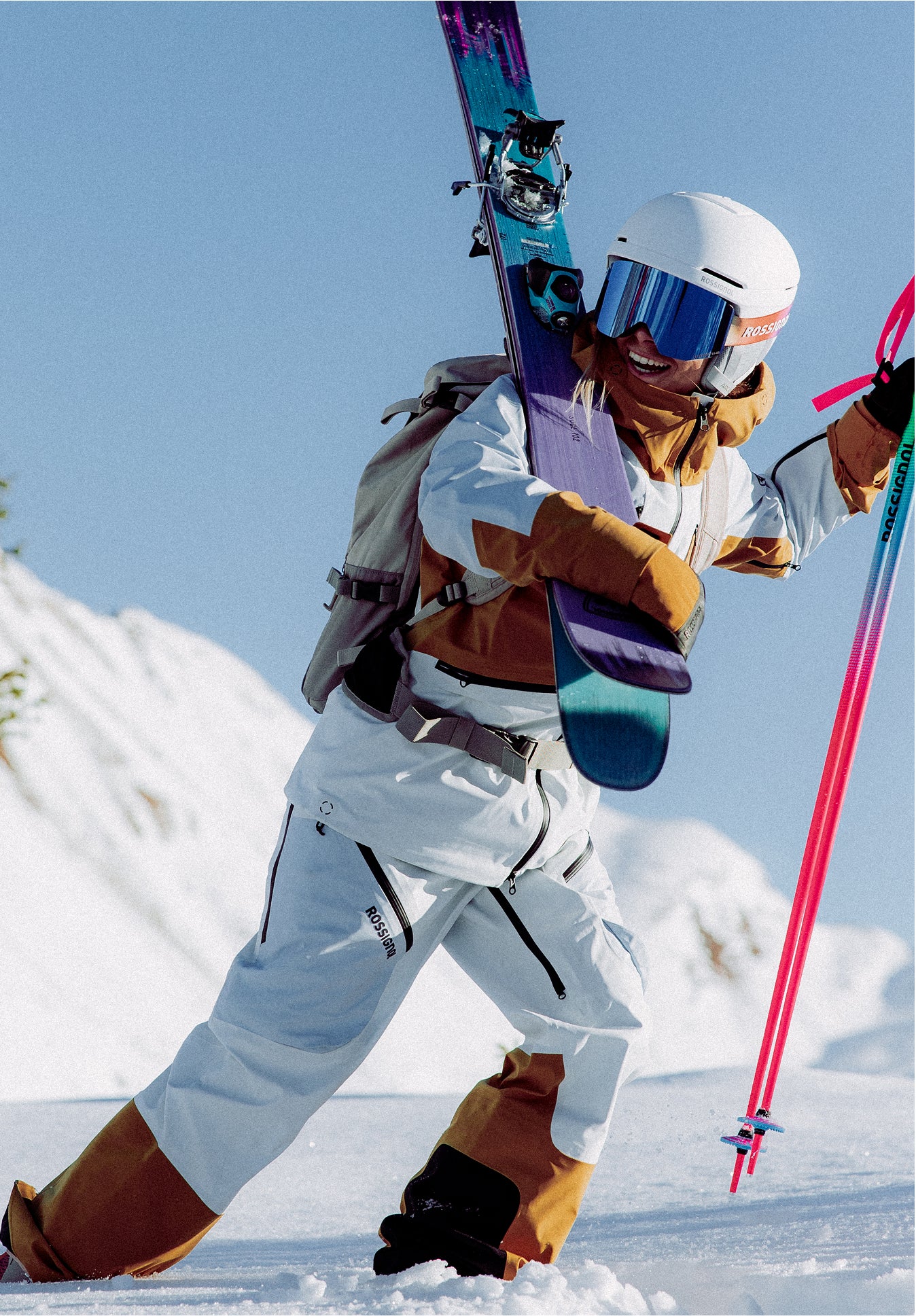 Rossignol Proclivity 3L Shell women’s ski jacket worn while skiing on a snowy mountain slope